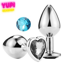 Серебристая металлическая анальная пробка Heart Light Blue M